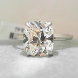 14K White Gold 0.06ctw Diamond Solitaire Ring