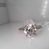 18K White Gold 0.06ctw Diamond Solitaire Ring