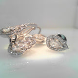 18K White Gold 0.94ctw/PS2.06ctw Studs Earrings